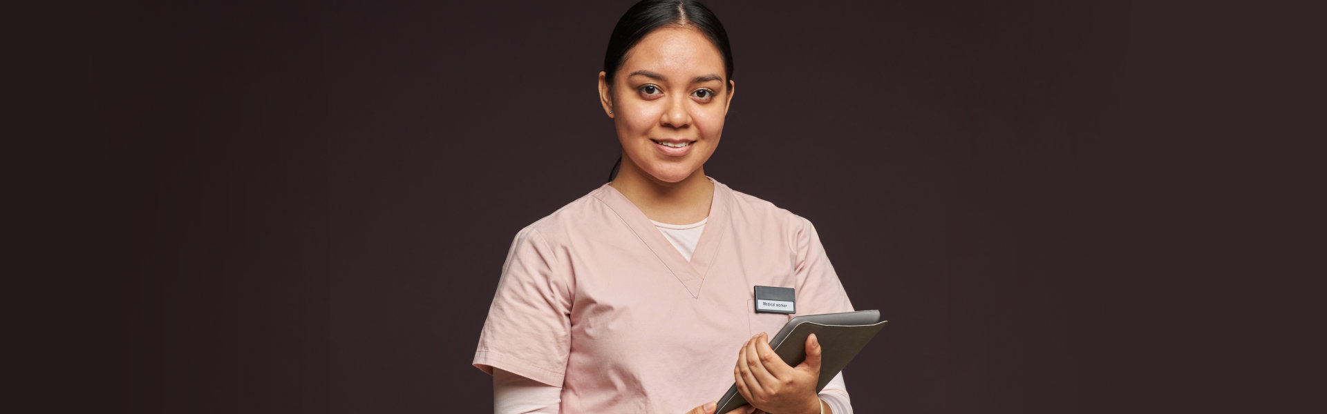 female healthcare worker smiling