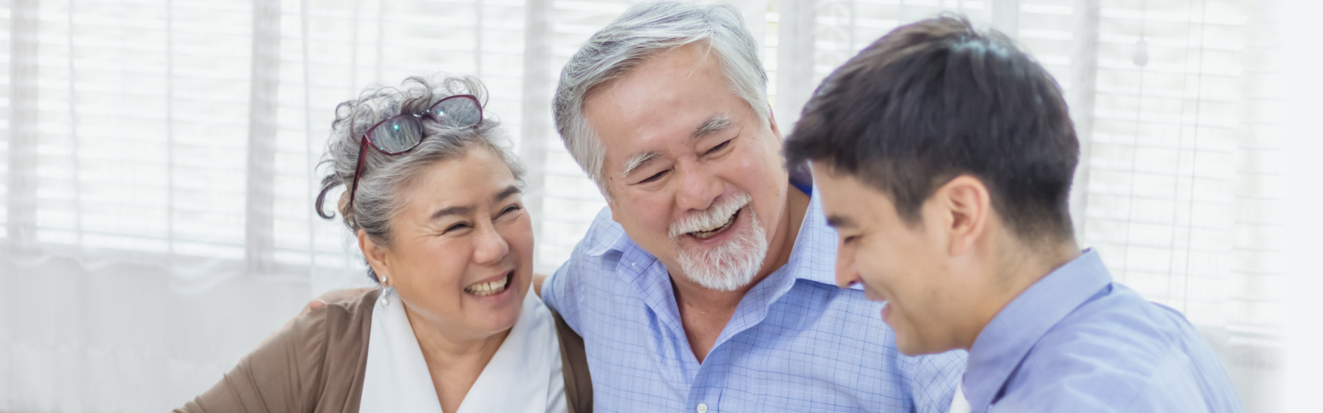 senior couple talking to an advisor