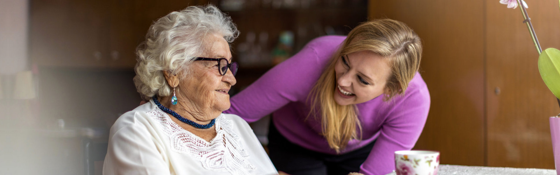 nurse comforting senior